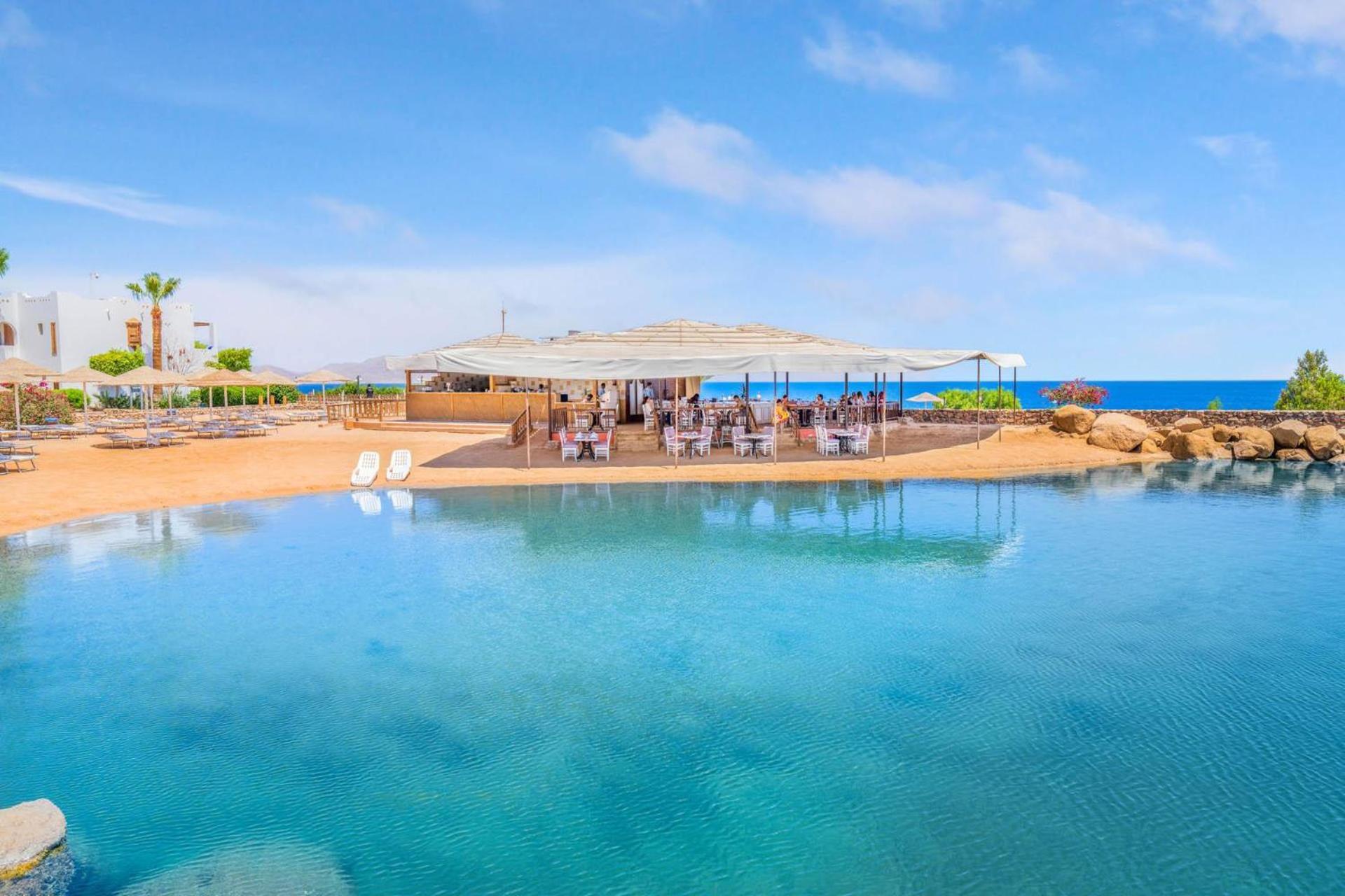 Domina Coral Bay Resort, Diving , Spa & Casino Sharm el-Sheikh Exterior foto The beach at the Dead Sea